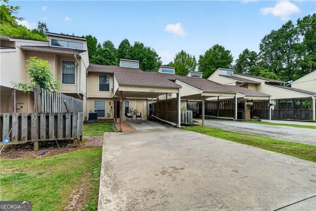 Photo of 6393 Hawthorne Terrace, Peachtree Corners, GA 30092 (MLS # 10763195)