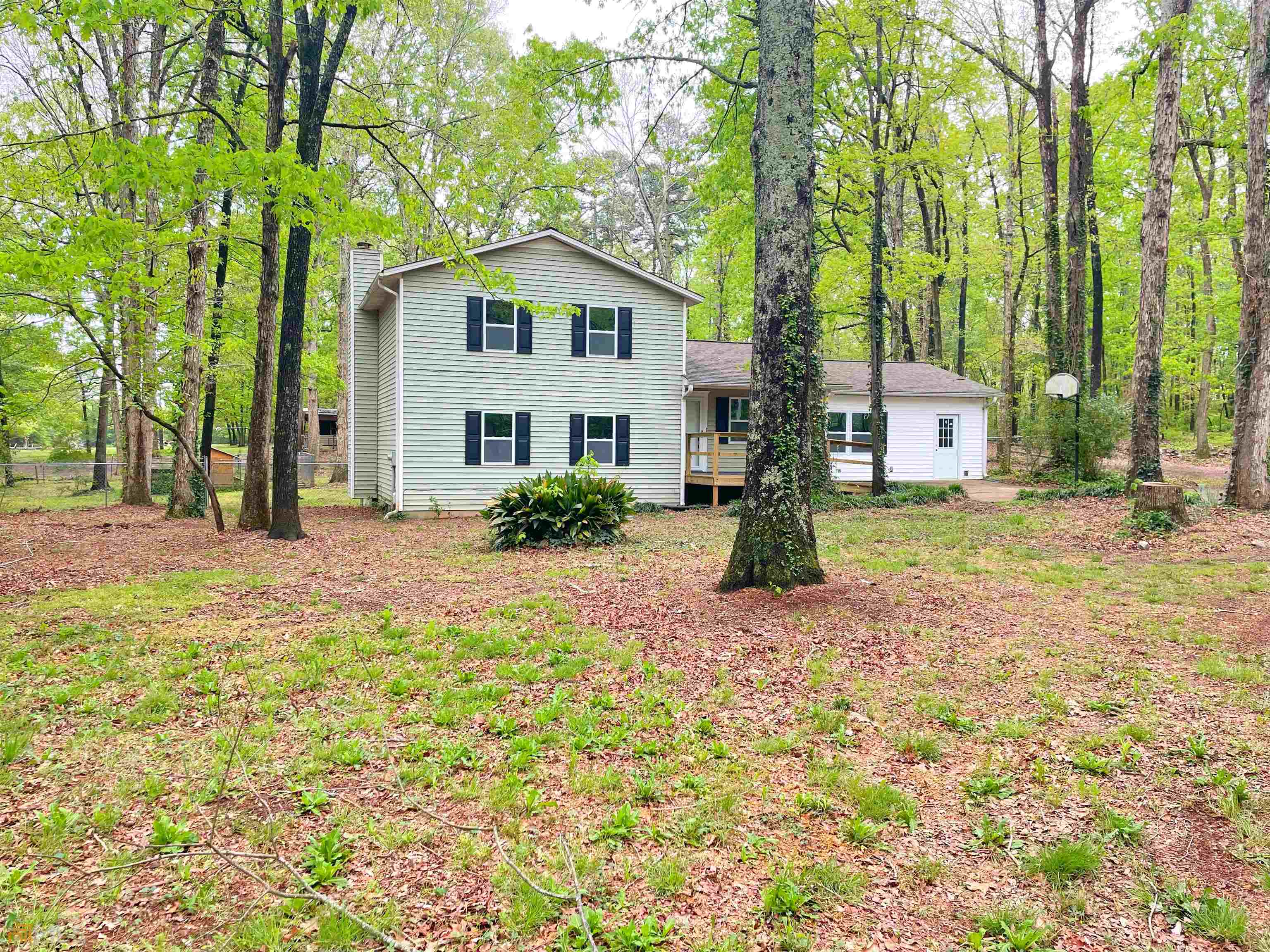 Recently renovated charming 3 bedroom 2 bathroom house on almost 3.5 ACRES minutes from Downtown Monroe. Roughly two thirds of the property are fully fenced in behind the main dwelling. This property is almost half way between everything Downtown Monroe and the new shopping center in Bethlehem have to offer! New floors throughout, new paint in the whole house, new fixtures in every room and an enclosed carport for more space and storage. This property will not last long!