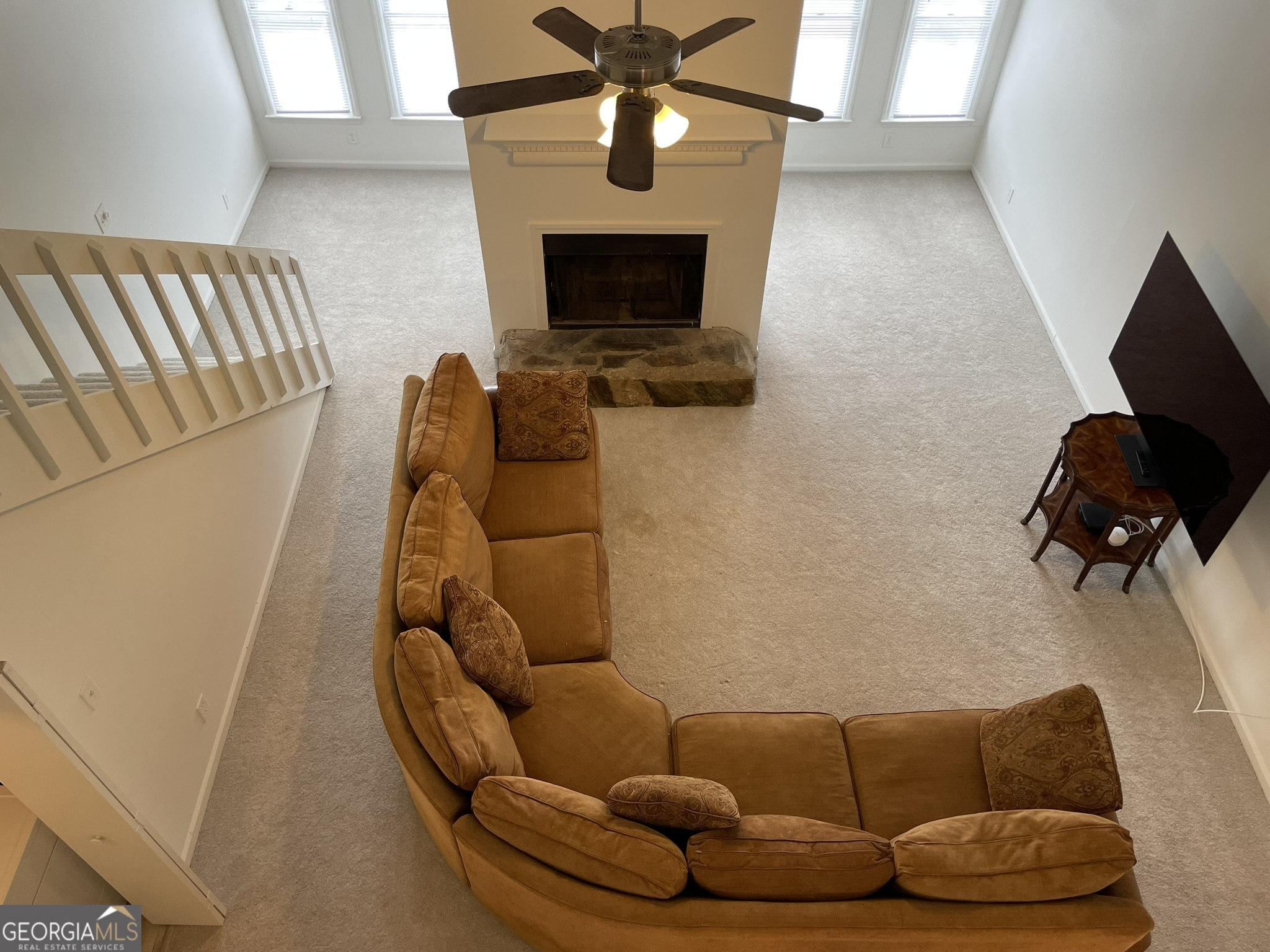 Move in Ready! This inviting high ceiling 2 bedroom, 2 full bath condominium offers a comfortable living space in a prime location. Minutes to UGA and downtown Athens. Situated in the Rivers Edge Condominium community, quiet and relaxing neighborhood. The unit features a spacious layout with a large living room, a well appointed kitchen, and an oversized master bedroom with a walk-in closet. Fresh new paint and new flooring throughout. Brand new water heater and electric panel, and updated HAVC. The master bedroom overlooks the 2 story living room, flanked by plenty of natural light from the sunroom full of windows. Low maintenance lifestyle with HOA managed yard care, exterior, and trash pickup. Plenty of parking. Perfect for Homeowners or Investors.