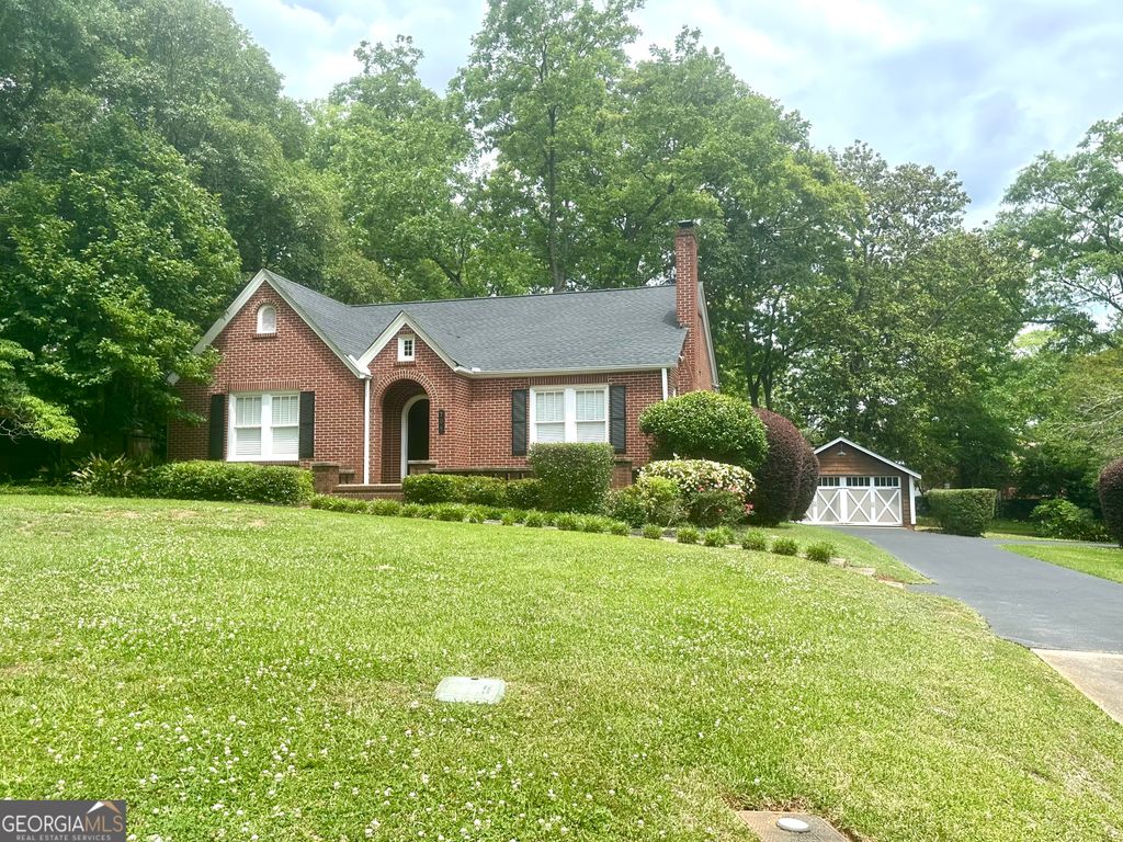Photo of 704 Woodland Dr, Griffin, GA 30224 (MLS # 10769496)