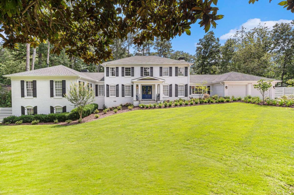 Come and see this amazing estate home! The CGrand OwnerCOs SuiteC on the main along with a large light-filled sun room are some of the cornerstones of gracious living in this 7-bedroom, 3 level all brick home located adjacent to the Dunwoody Country Club. The striking curb appeal and showcase gardens positioned on this large acre lot makes this home a landmark in the neighborhood. Yet a few blocks away you can walk, ride, bike, etc to all the conveniences you need: shops including groceries, shopping, and restaurants, and local family- owned businesses. Greet guests in the welcoming foyer, flanked on the left by the conversational living room and on the right by the large dining room which are great for parties of 8 or more. Straight ahead is the heart of the home, a beautiful well-appointed kitchen and breathtaking Cgarden-viewC sun room. There is a perfectly scaled den with and soaring ceilings along with a gas log fireplace to retreat to for more intimate gatherings. Further on is access to the 2-car garage, one of two main level powder rooms, the laundry room and a serene 12x13 bonus room with private entrance from the drive (well-suited as a study, office or potential ADU). The opposite wing of the home includes a breakfast room off the kitchen and an impressive entrance hall with beautiful glass and iron doors marking the entrance to, and providing privacy for, the OwnerCOs Suite. This grand bedroom has 13ft tray ceilings with accent lighting and a gas log fireplace surrounded by french doors leading to a screened-in private sitting room. The spacious ownerCOs bathroom includes his and her walk-in closets, its own washer/dryer connections, steam glass shower, jacuzzi tub, his and her separate vanities and cabinetry and a private water closet with a bidet. The upper level has an amazing guest suite with ensuite bathroom, as well as two bedrooms which share a full bath. The lower terrace level is full of light, large in-law style suite/apartment type living space with 2 bedrooms and baths, huge living room area with fireplace, kitchenette and private screened in porch. The meticulously designed yard underwent a complete transformation, offering a view from any area of the back yard to the abundance of color and flowers year-round. With new fencing, walkways, irrigation and new drainage system, the property exudes a luxurious resort-like ambiance . The home is perfect for the multi-generational families as everyone has their own space if they want it. This home is truly a grand lifestyle which needs to be seen to be believed. Welcome!