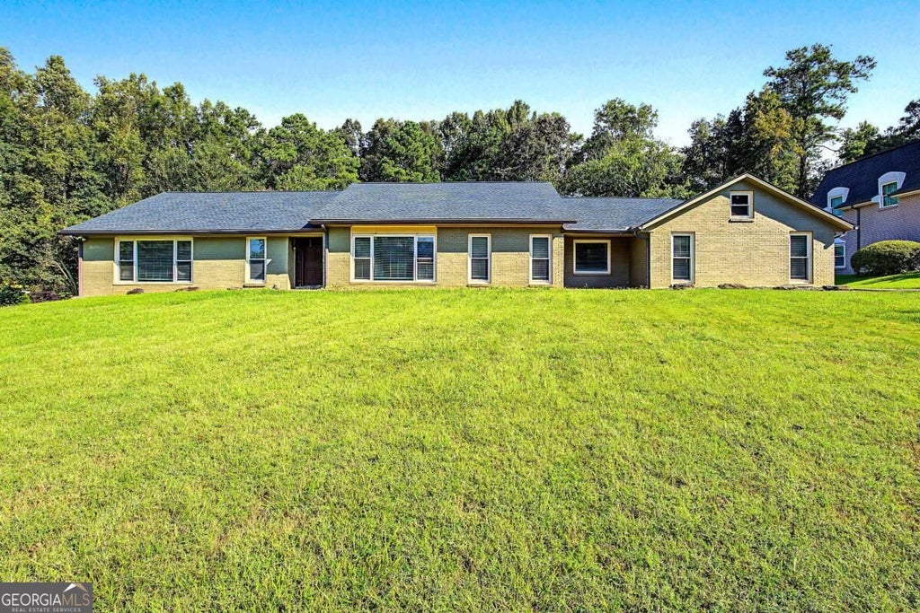 Photo of 875 Hickory Oak Hollow, Roswell, GA 30075 (MLS # 10854441)