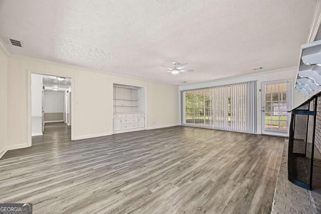 Photo of 875 Hickory Oak Hollow, Roswell, GA 30075 (MLS # 10854441)
