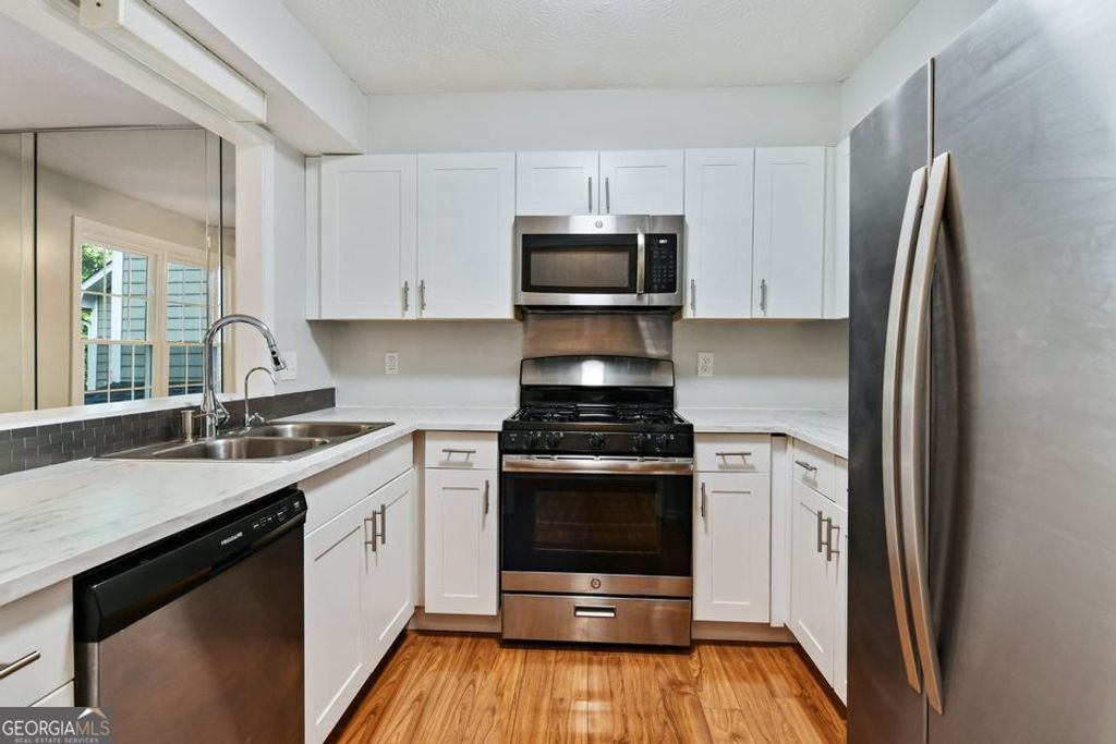 Photo of 1445 Oakridge Circle, Decatur, GA 30033 (MLS # 10757136)