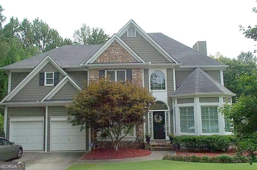 Photo of 10635 Cauley Creek Drive, Johns Creek, GA 30097 (MLS # 10851445)