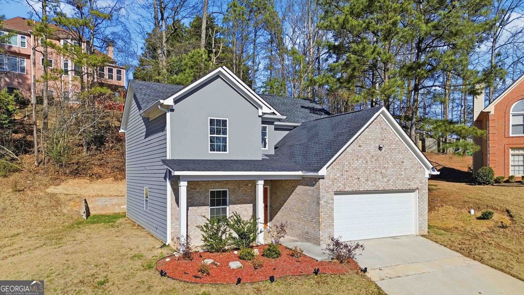 Photo of 6938 Shadow Ridge Lane, Stone Mountain, GA 30087 (MLS # 10725603)