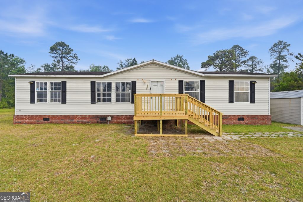 Photo of 135 Tupelo Loop NE, Ludowici, GA 31316 (MLS # 10738896)