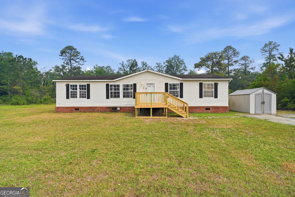 Photo of 135 Tupelo Loop NE, Ludowici, GA 31316 (MLS # 10738896)