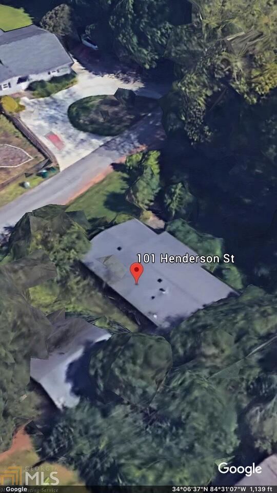 Lot for Sale. Walking distance from down town Woodstock. Property sold as is.