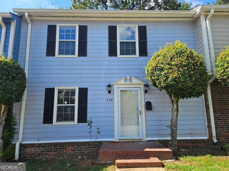 Welcome to this beautifully renovated townhome in the thriving Decatur neighborhood. This amazing 3 bedroom, 2.5 bath townhome features an inviting neutral paint throughout and Hardwood floors on the main level. The gourmet kitchen has ample cabinetry and counterspace, SS appliances and breakfast area. The true dining space is adjacent to the eat-in kitchen and flows seamlessly to the main living space, which is embellished with a beautiful fireplace and original built-in shelving on either side. If you love entertaining, the enclosed deck at the back is ideal for that. This spacious house has two secondary bedrooms upstairs with a hall guest bathroom. Finally after a long day retire into the primary suite with its own bathroom. Enjoy worry free living for years to come as the HOA takes care of the roof, exterior maintenance, water, trash, sewer, landscaping & insurance. Close proximity to I-285, I-20, shopping, restaurants, and only 15 minutes from downtown Atlanta. It won't last long. Please bring in your offers. SELLER WILL CONTRIBUTE $2000 CONCESSION TOWARDS BUYER'S CLOSING COST FOR A FULL PRICE OFFER.