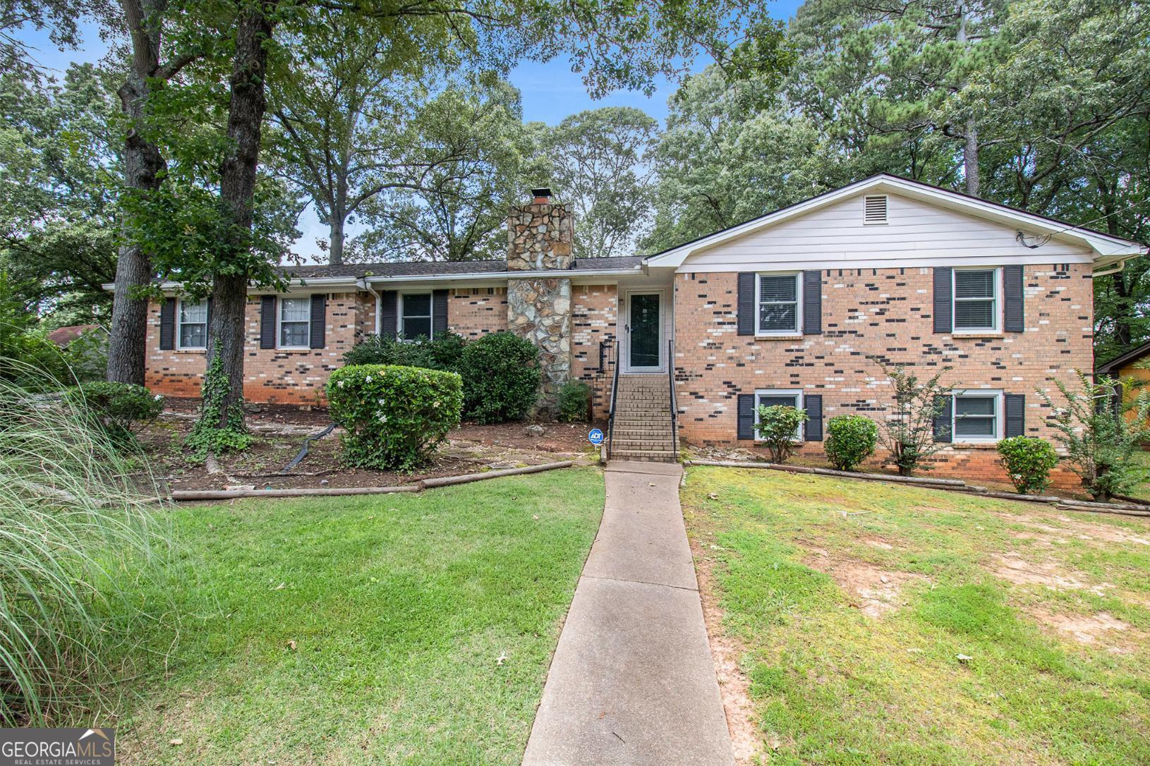 Discover this beautifully maintained and charming 3-bedroom, 3-bath home, filled with natural light and featuring gleaming hardwood floors throughout the main living areas. Recent upgrades include brand new Anderson windows installed in May 2025, offering wonderful sunlight, energy efficiency, and timeless style. The roof is only six years old, and the water heater is just three years old, providing peace of mind for the new owners. Enjoy cozy evenings by the gas fireplace, perfect for both entertaining and quiet relaxation. Step outside to a generous screened-in deck overlooking the fenced backyard, an ideal space for morning coffee or hosting gatherings. A charming storage shed in the back provides extra space for tools, toys, or creative projects. The home also features a convenient side-entry garage, enhancing its curb appeal. The daylight basement offers versatile space that could be used as a home office, media room, or guest suite. This home provides a wonderful combination of warmth, functionality, and style, making it a truly inviting place to live.