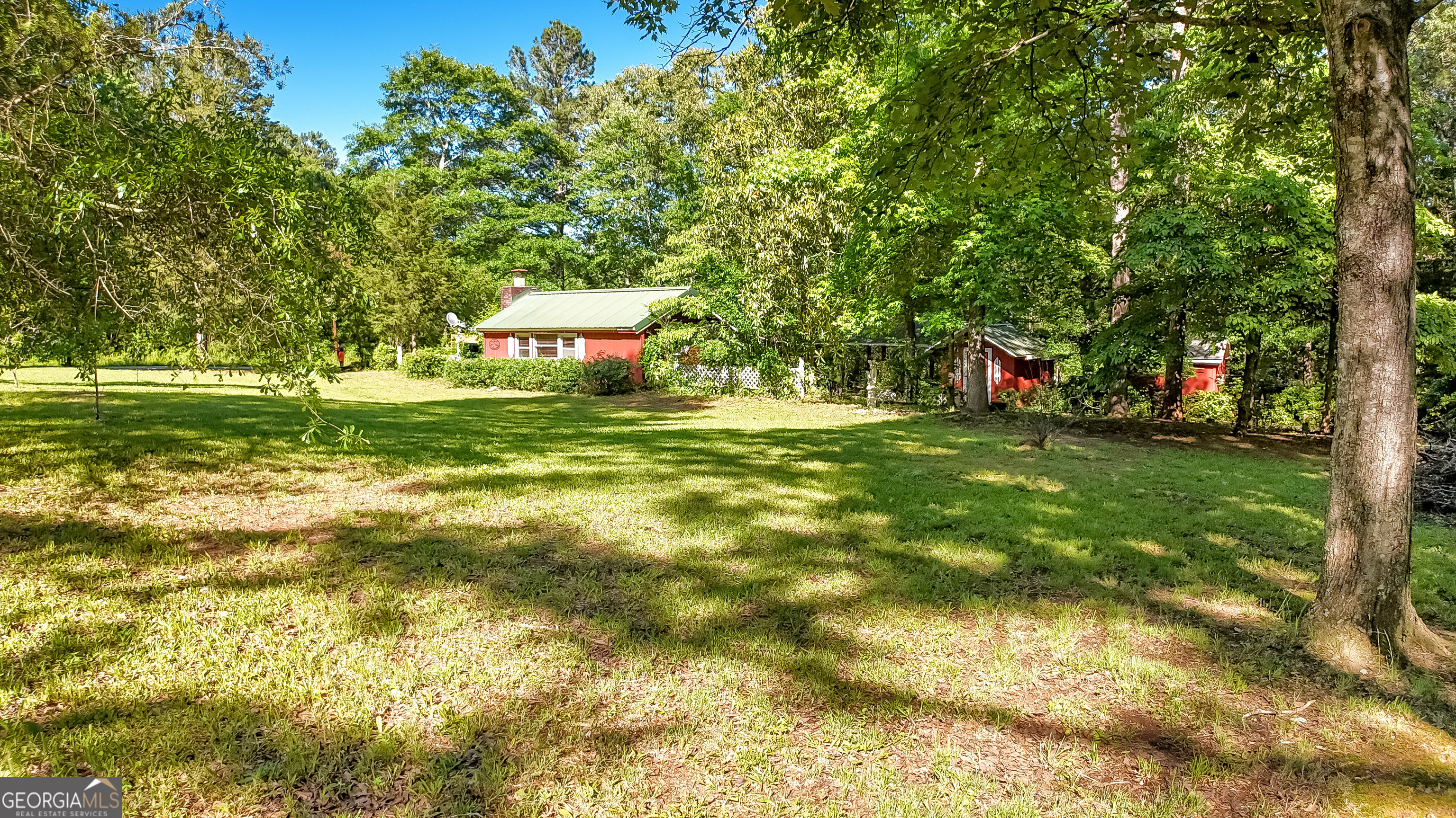 If you're looking for a weekend getaway with three RV hook-ups, a cozy little cottage, and so much more, this may be what you're looking for! Located .2 miles from Bruce Creek Boat Ramp and Recreation Area. Whether you're dreaming of a peaceful weekend escape or an action-packed time on the lake, this spot checks the boxes! Sitting on a total of .96 acres, this property has plenty of space to enjoy friends and family or to park your very own RV and have a camping retreat. Plenty of room to park your boats and campers with three outbuildings on the property. This offers room for storage, hobbies, or future upgrades. Great investment potential for possible rental income, etc. Bring your ideas and make this place your dream weekend retreat! This listing includes 212 Catalina Dr.,188 Catalina Dr., and 46 Century Lane.