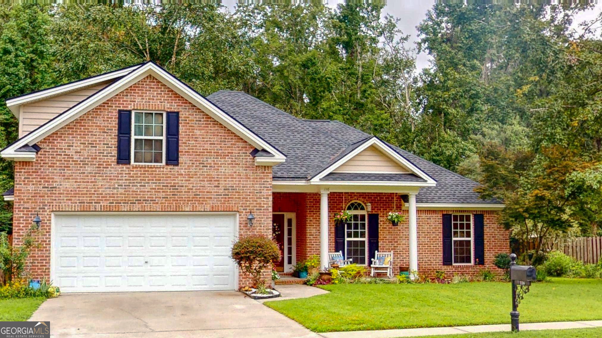 This beautiful full brick home is a piece of paradise. Four bedrooms and three baths, perfect open concept. Living area, with a gas fireplace, dinning, kitchen, breakfast area creates a inviting and warm atmosphere. Primary bedroom boast high ceiling, large closets, soaking tub, separate shower, double sinks. Split floor plans features two guest bedrooms and a guest full bath. Upstairs is the fourth bedroom with a private bath. Enjoy morning coffee on the covered and screened patio, overlooking the lovely private fenced yard.