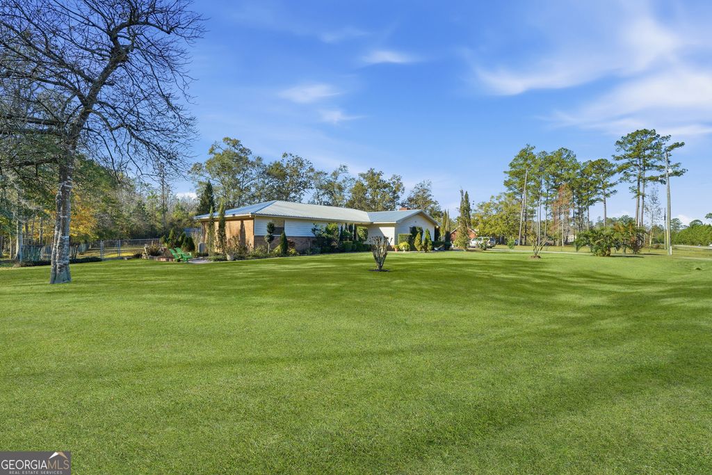 Photo of 863 N Macon Street, Ludowici, GA 31316 (MLS # 10657118)