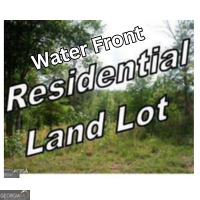 Beautiful Building lots on Lake Tobesofkee. Big Water and Big Views. Subject Property only a portion of legal description. Established neighborhood. 410 Feet of Lake Frontage. Standing on the lot looking at the lake facing left, perfect sunset view all year long.