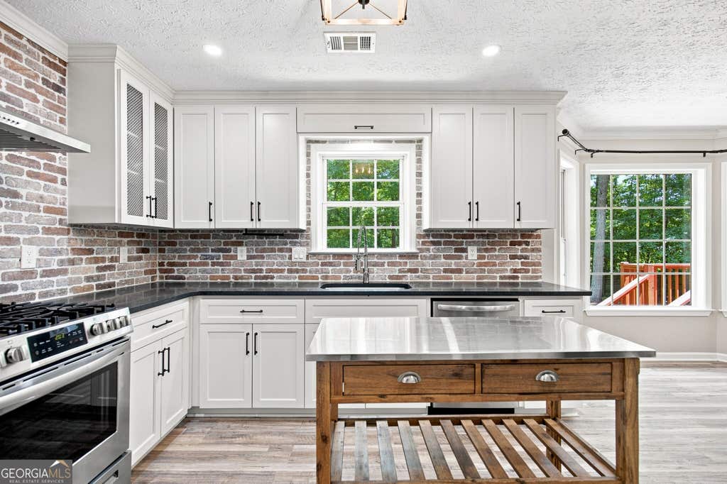 Photo of 15 Stonewood Way, Sharpsburg, GA 30277 (MLS # 10826543)