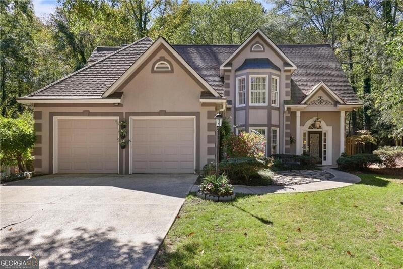 Kennesaw Battlefield National Park right out your back door !!! Welcome Home! This beautiful, well-maintained traditional home situated on 1/2+ acres has it all! Close to bustling Marietta Square, and located in highly sought after Lee's Crossing with its quiet neighborhood streets, sparkling Swim/Tennis facilities and all its fabulous amenities! The first floor boasts a spacious primary suite with 2-tiered tray ceiling, double vanity, garden tub, separate shower and ample walk-in closet. A lovely Eat-In Kitchen with updated granite countertops opens to the light filled Great Room. The Dining room features a striking bay window with plantation shutters. A trip up the gorgeous extra-wide staircase to the second floor reveals stunning view down into the great room and front entrance areas. Upstairs you'll find a versatile Sitting Area/Family Room and 3 large Bedrooms and Guest Bath. Take a walk outside to experience the great outdoors where relaxation awaits on your gorgeous wood deck, in your private, fenced backyard! Proceed to the back of the yard to your private entrance to Kennesaw Battlefield National Park and miles of beautiful, wooded hiking trails. Truly a wonderful place to call home!