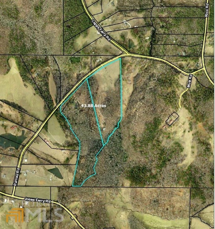 This property has approximately 8 acres of open pasture (not fenced) with the rest wooded. It has a small pond and several outbuildings. There is a 1333 sq. ft. 2 BR/2 Bath house built in 1982 that is in need of major renovation. This is within 5 minutes of Serenbe and 2 minutes of the South Fulton Parkway.