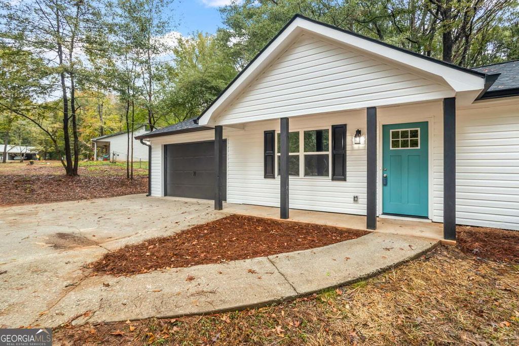 Photo of 25 Woodcrest Drive, Covington, GA 30016 (MLS # 10653501)