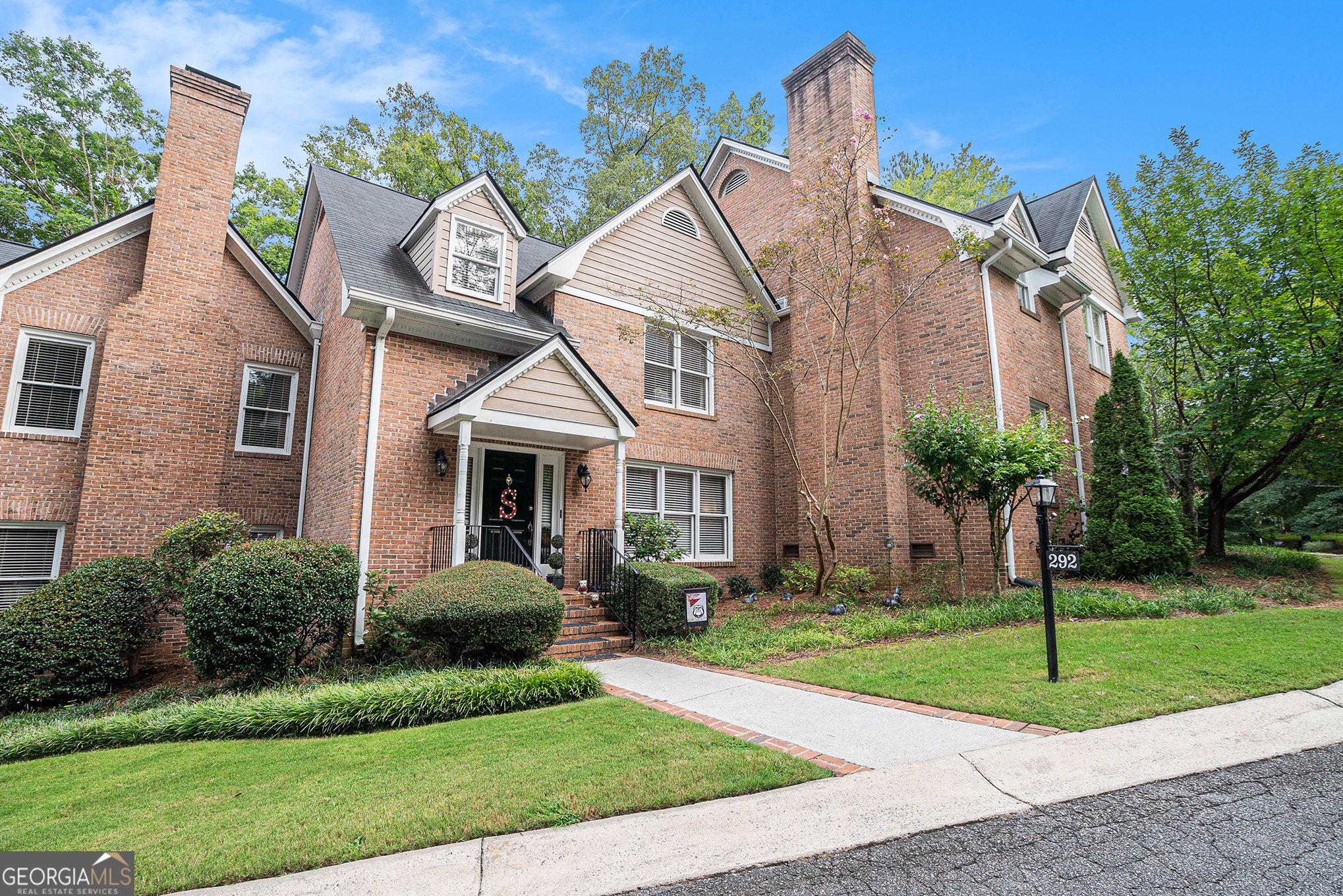 Come check out this home in the Wood Lake neighborhood. The home has a brick exterior with a cozy front porch and a nice wood deck nestled in the shade in the back. There is a small parking lot for residents and guests. The Wood Lake neighborhood has a pool, a lake, and a security gate. Located right off 316, right down from Timothy Road, so it is a short drive to shopping and restaurants in the Oconee Connector area. Walking into the house, you are greeted with a two-story entrance way, neutral paint, and an open floor plan. The living room is spacious with a fireplace and plenty of natural light. The kitchen has Corian countertops and painted cabinets. Off the kitchen is a great space for a breakfast nook or office. The master is on the main level, and a second master and a small bedroom are upstairs. Home has crown molding, updated countertops in the bathroom. These homes don't come on the market often, so don't miss your opportunity to own this beauty. Schedule your showing today.