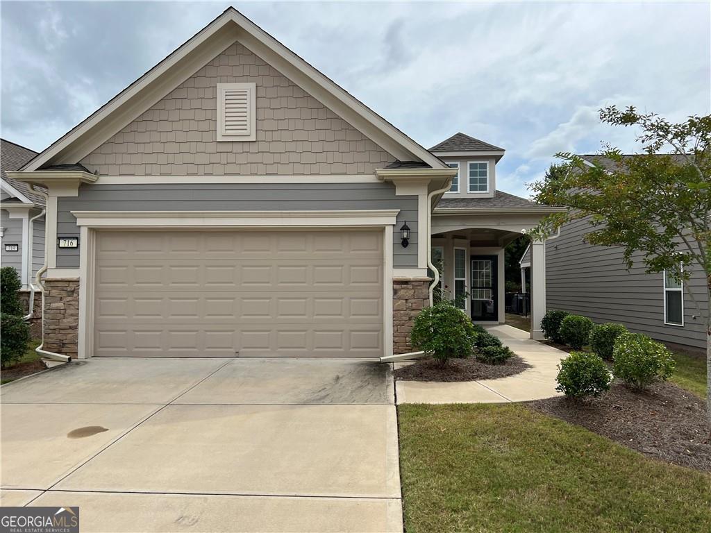 If you are looking for a remarkable neighborhood for the 55+ community, this is it. With all the amenities that you could desire right at your fingertips. This is truly resort style living without leaving your neighborhood; tennis, gold, pickle ball, swimming pools theater, physical fitness facilities and so much more. Welcome to this two bedroom, two bathroom, open concept living home. Hardwood floors invite you into the great room, dining room, kitchen and sunroom areas. Enjoy the flex room which could be an office/study or craft room. Relax in the great room by the fireplace while entertaining family and friends in the spacious dining area and kitchen with large island. Stainless steel appliances complete this gourmet style kitchen. Primary suite has en-suite bath with dual vanity, walk in shower with seating and large walk in closet. Secondary bedroom also includes bidet with tub/shower combination. Enjoy relaxing on your front or rear patios on those cool autumn evenings. If this is the lifestyle you are seeking........this is the place to be!!