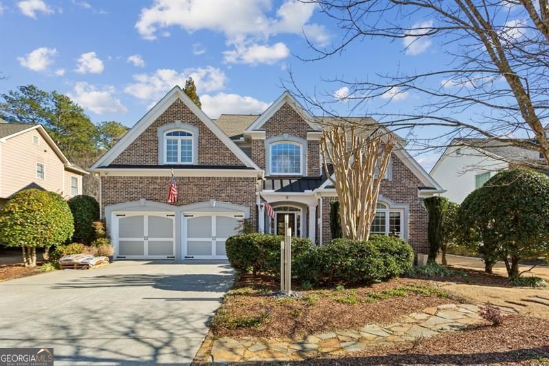 HUGE PRICE REDUCTION AND SELLER WILL PAY $10,000 IN CLOSING COSTS! Recent comparable down the street just closed at $721,800! This is the one you have been waiting for! Unbelievable value for this beautiful and well maintained traditional in sought after Lakefield Manor on almost 1/2 acre lot! Hardwood floors throughout the entire main level, two story foyer as well as two story great room; formal living opens to formal dining room. Bedroom on main level was designed for first floor office with full bath! Eat-in kitchen is open to family room and overlooks stone patio and huge garden friendly backyard! The garden and garden shed was previously featured in the AJC! Upstairs has a large master suite with a sitting area and additional closet space plus a large walk-in closet. Master bathroom features separate his and her vanities with garden tub and oversized shower. There are 2 other bedrooms with a large updated bath in between. Neighborhood features wonderful amenities to include 2 swimming pools (main pool and kiddie pool), playground, 3 fish stocked lakes, walking paths, tennis courts, and even a central park with a picnic pavilion and fire pit that hosts many neighborhood events! Great schools (walking distance to Cheatham Hills Elementary)! Shopping and dining conveniences close-by and Marietta Square is a major attraction too!
