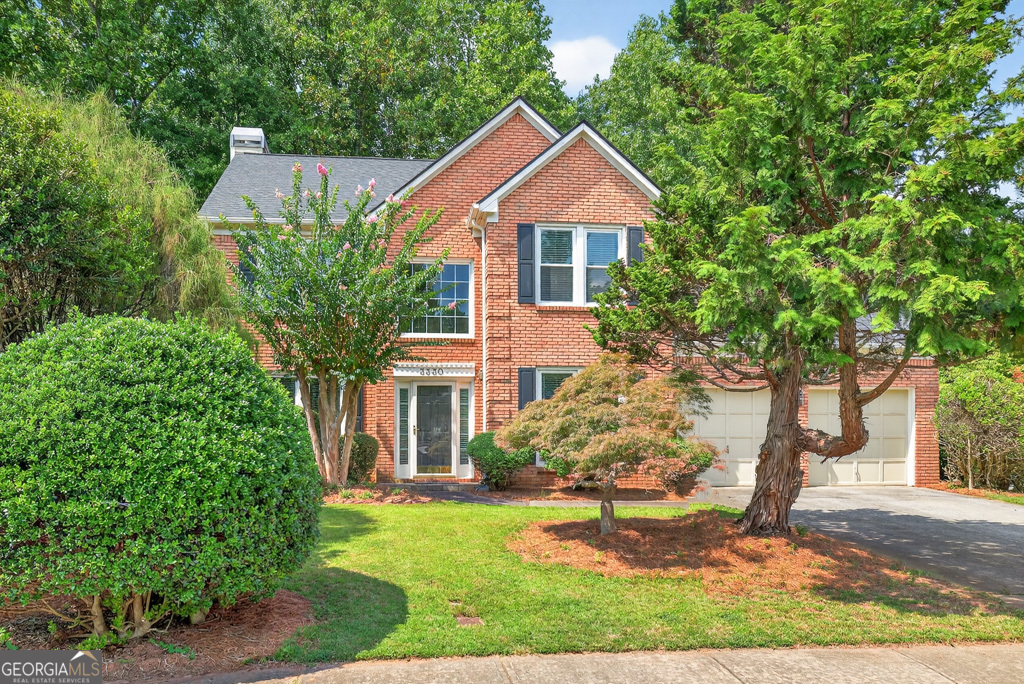 This well-maintained 4-bed, 2.5-bath home in sought-after Avocet offers an ideal blend of updates, space, and community amenities. From the entry, the formal dining room is on the right and living room on the left. The kitchen features granite counters, stainless appliances, and a large island open to the family room with a gas log fireplace. An XL tiled sunroom overlooks the wooded, private backyard-perfect for morning coffee or evenings with family. Upstairs, the primary suite includes a tray ceiling, double vanities, soaking tub, separate shower, and walk-in closet. Three additional bedrooms include a flexible bonus room for work, media, or play. Updates such as a new roof, modern light fixtures, and refreshed faucets and vanities add appeal. Avocet is a vibrant swim/tennis community with sidewalks, pool, tennis courts, and playground. Minutes to The Forum and Town Center for dining, shopping, and festivals-plus Starbucks and Dunkin around the corner. Don't miss this opportunity in one of Peachtree Corners' premier neighborhoods!