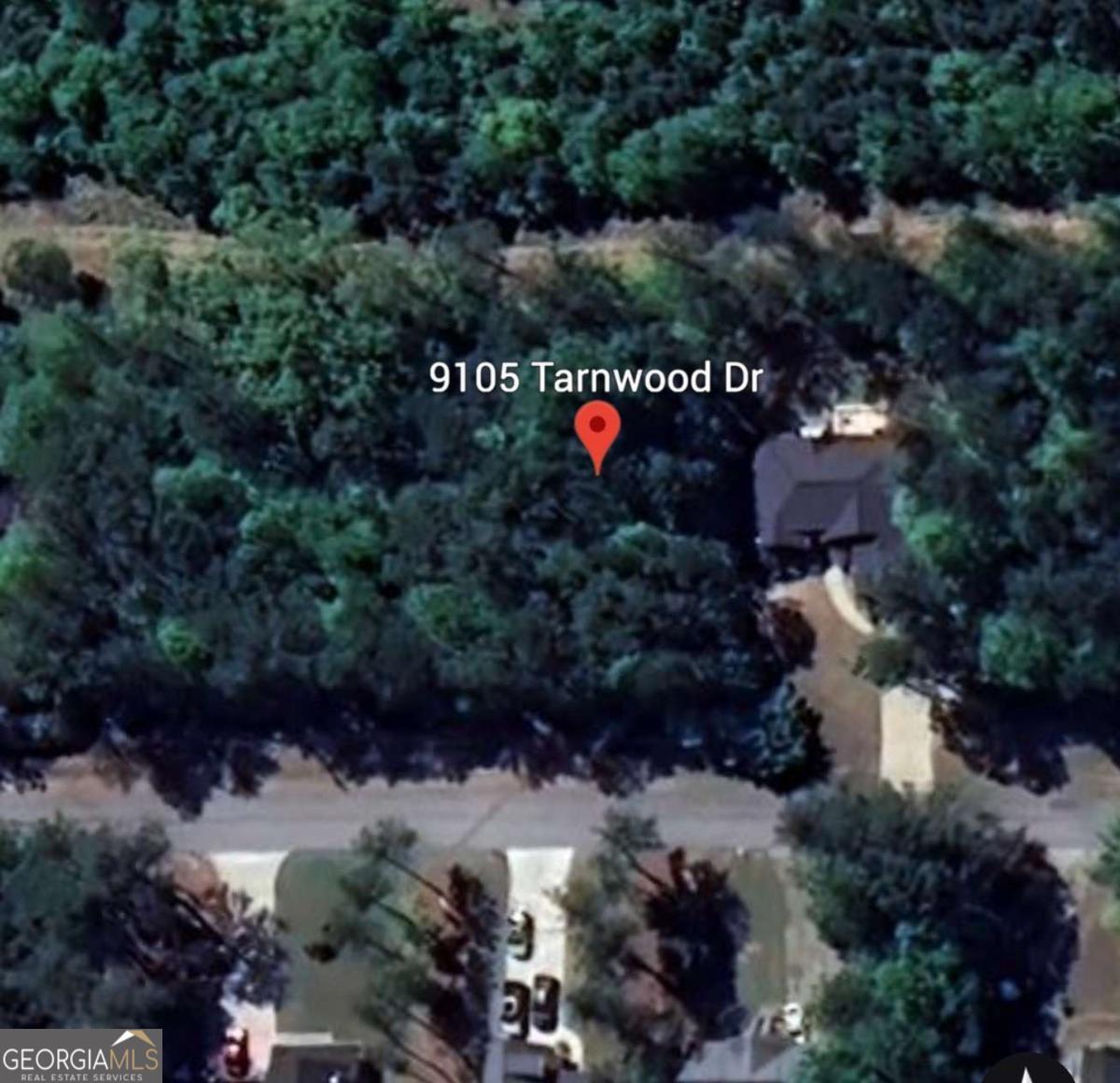 Incredible opportunity to own a surveyed lot that borders serene, privately-owned land in the highly desirable Fairfield Plantation community. This sought-after neighborhood is packed with amenities including two swimming pools, a country club and lakeside marina with dining, three picturesque lakes, tennis and pickleball courts, scenic hiking trails, a playground, lakeside beach, a top-tier 18-hole championship golf course, a recreation center, and gated security. Sewer access is available!