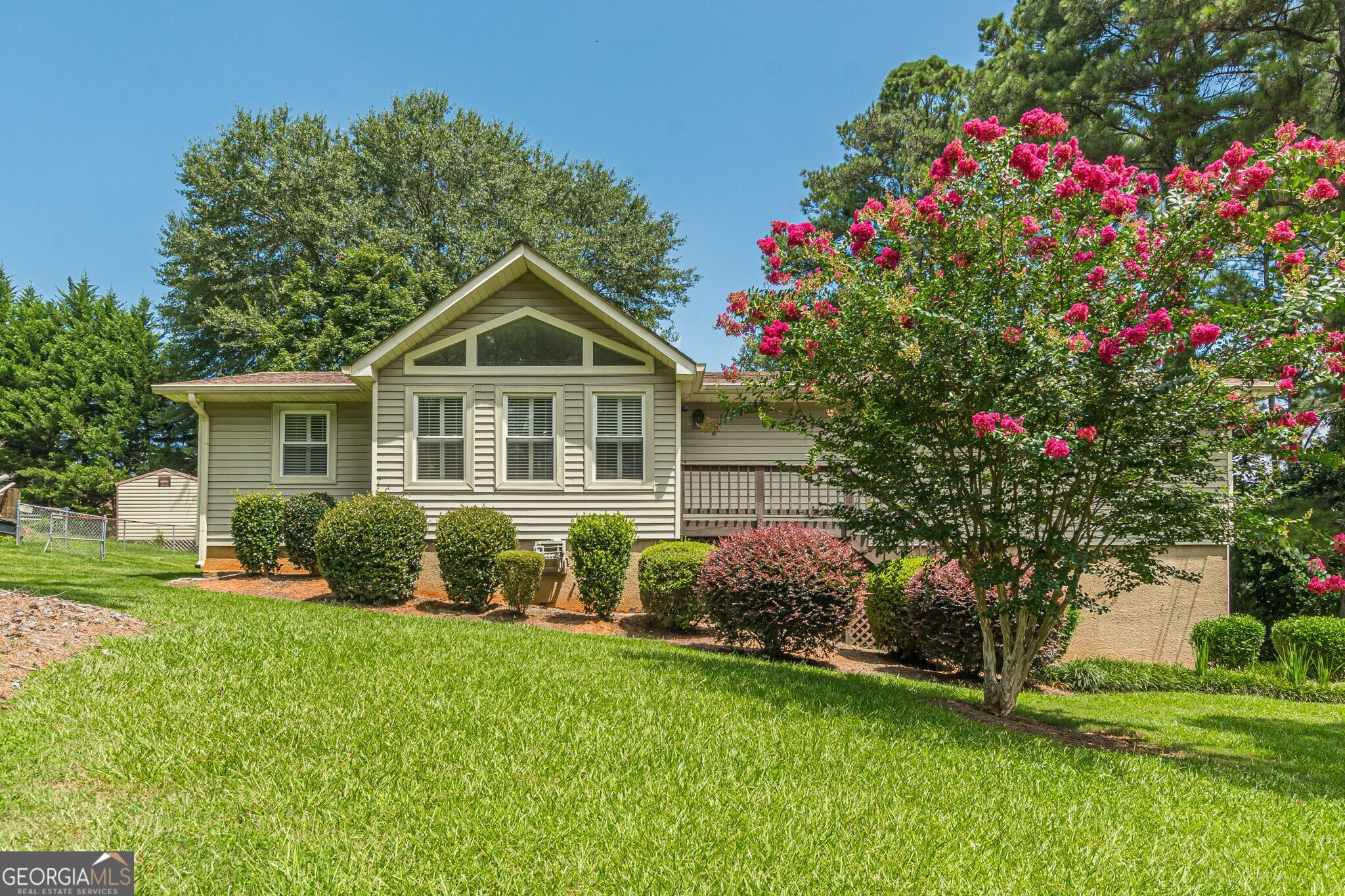 Well-built traditional home in established neighborhood with top schools! Charming floorplan with plantation shutters, spacious great room w/rock fireplace and lovely screened porch, perfect for quiet evenings. Sunny chef's kitchen, formal dining room, and updated baths. Three generous bedrooms with great closet space. Large basement for future expansion and excellent storage. Needs some TLC (paint/carpet) and sold as-is. Convenient to airport and major highways! Hurry today!