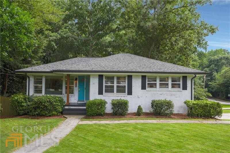 Absolutely adorable 4 sided brick cottage on a full finished basement near the Marietta Square! Gorgeous kitchen with designer light fixtures, granite counters and stainless appliances. 3 bedrooms and 1.5 baths on the main level (one bedroom is small and currently staged as an office) PLUS a full basement with 2 additional bedrooms and a full bath, a living room and a large room that previously had a kitchenette. Would be a perfect in-law suite. Tons of charm on this cottage. Great street (I grew up myself on Brookwood) and it's close to everything - grocery store, government buildings, the Square, all schools.