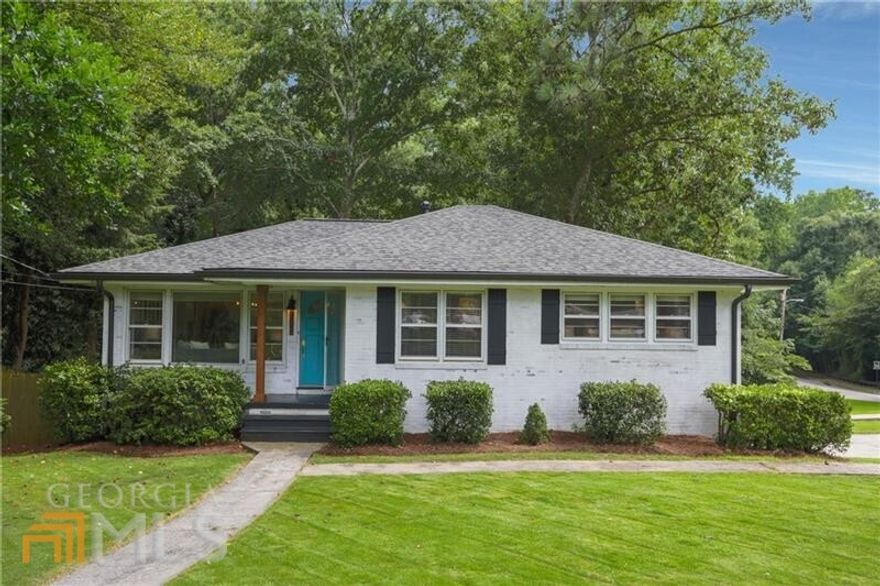 Absolutely adorable 4 sided brick cottage on a full finished basement near the Marietta Square! Gorgeous kitchen with designer light fixtures, granite counters and stainless appliances. 3 bedrooms and 1.5 baths on the main level (one bedroom is small and currently staged as an office) PLUS a full basement with 2 additional bedrooms and a full bath, a living room and a large room that previously had a kitchenette.  Would be a perfect in-law suite. Tons of charm on this cottage.  Great street (I grew up myself on Brookwood) and it's close to everything - grocery store, government buildings, the Square, all schools.