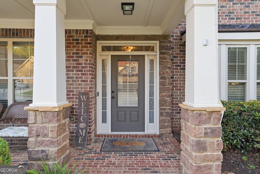 Photo of 4121 Secret Shoals Way, Buford, GA 30518 (MLS # 10834616)