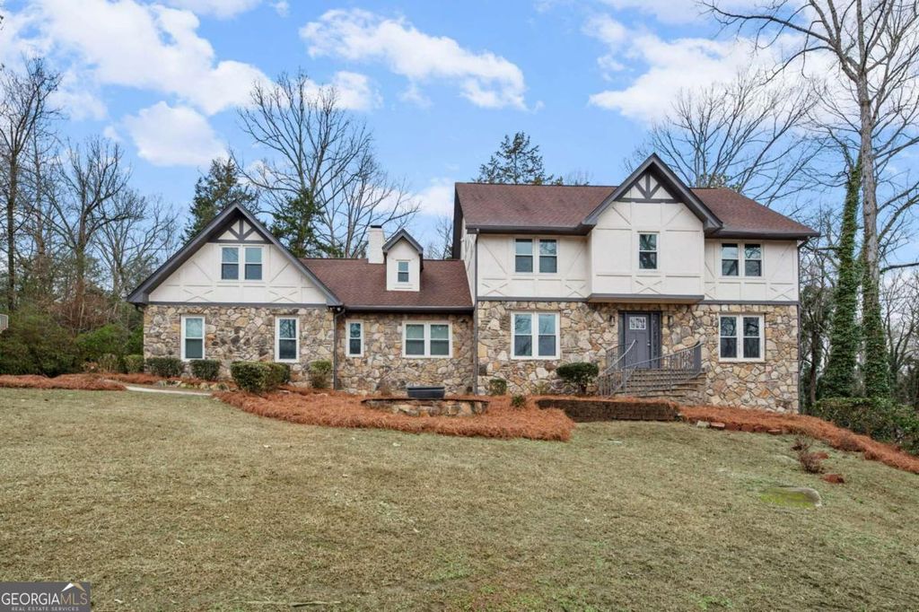 Photo of 4947 Castlewood Drive SW, Lilburn, GA 30047 (MLS # 10679524)