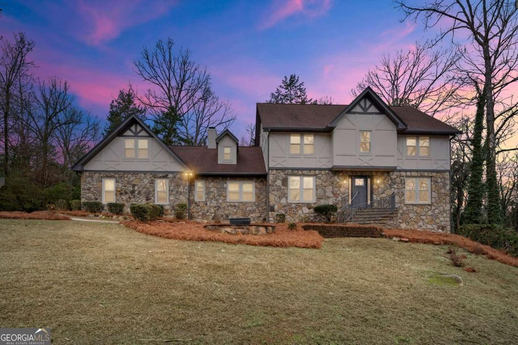 Photo of 4947 Castlewood Drive SW, Lilburn, GA 30047 (MLS # 10679524)