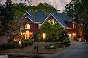 Stunning move-in ready brick home in desirable Kimball Farms! Welcome to this exquisite 7-bedroom, 5-bathroom residence tucked away on a quiet cul-de-sac in one of AlpharettaCOs most coveted neighborhoodsCoKimball Farms. This beautiful, move-in ready brick home offers a spacious open-concept floor plan with high-end finishes and thoughtfully designed spaces for both entertaining and everyday living. Kimball Farms is packed with amenities including a newly renovated clubhouse, swimming pool, tennis and pickleball courts, and easy access to the greenway trail. Just a short stroll to New Prospect Elementary School and only minutes from Avalon and Downtown Alpharetta, where youCOll find premier dining, shopping, movie theaters, ice skating, and the beloved farmerCOs market. Step inside to discover a gourmet kitchen thatCOs truly a chefCOs dreamCofeaturing blown glass pendant lighting, an elongated island, custom cabinetry with pull-out shelving, GE Monogram appliances, a warming drawer, 48 inch gas range with grill, griddle and double ovens, and one of a kind copper sink. The kitchen opens seamlessly into a two-story vaulted fireside family room with a floor-to-ceiling stacked stone fireplace, creating a cozy yet grand space perfect for fall evenings and holiday gatherings. The main-level includes a spacious guest bedroom adjacent to a guest bathroom that has been beautifully renovated with a marble walk-in shower. The third level includes four bedrooms and three bathrooms, including a huge primary suite that is a true retreat, showcasing a zero-entry shower, floor-to-ceiling tile work, dual vanities and an expansive walk-in closet. Additional features include sunlight breakfast room, mature landscaping, serene fountain and well maintained systems with the roof only being 6 years old. Downstairs, the full finished basement offers two additional bedrooms, custom built in cabinetry, a media room, a built-in sauna, and a pool tableCowhich is included with the home! Outside, enjoy unforgettable evenings with family and friends around the slate patio firepit with built-in stone seating, or unwind on the low-maintenance Trex deck, ideal for grilling and outdoor entertaining. ThereCOs also a "he-shed"Coincredibly sturdy and equipped with a TV and potential bar space for the ultimate hangout, including additional storage space in the rear. A spacious three-car garage provides plenty of room for vehicles, storage, and all your outdoor gear. You canCOt beat this location, neighborhood, and school districtCocome experience everything this spectacular home has to offer!