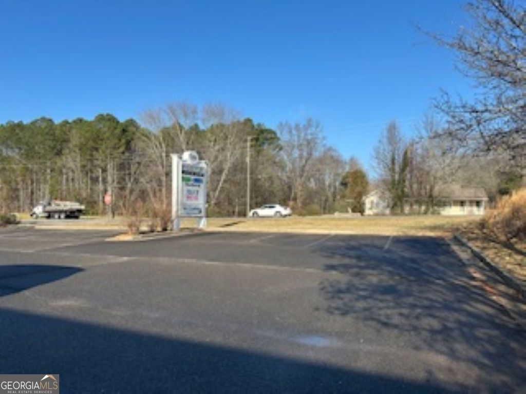 Photo of 7850 E Cumming Hwy, Canton, GA 30115 (MLS # 10668295)