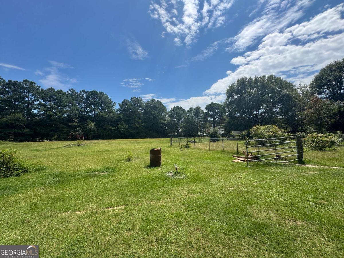 Discover the perfect opportunity to build your dream home on this 3.46-acre flat and open property. Featuring two driveways for easy access and a storage shed already on site, this land is ready for your vision. With water and power available at the road, the groundwork is set for a smooth build. Enjoy the privacy and space of country living while still being just minutes from Hiram, Dallas, Lithia Springs, and quick access to I-20. Whether you're looking to create a custom estate, add a hobby farm, or simply enjoy open land with room to grow, this property offers endless potential.