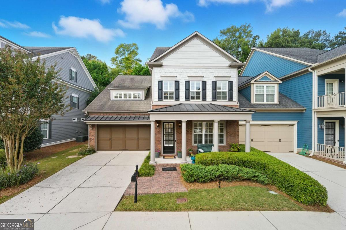 Welcome to 1048 Regal Hills Lane - a rare opportunity in the sought-after Providence community of Mableton, Georgia. With only 18 of these exclusive homes built, opportunities to own one are few and far between. In fact, the last time a unit like this became available was in 2022. What makes it so special is the remarkable combination of size, privacy, and convenience: over 4,000 square feet of living space across three levels, paired with a large private backyard and patio-all while enjoying the low-maintenance lifestyle of a townhome. Step inside and discover a main level designed for both everyday living and entertaining. The two-car garage opens directly into the home for convenience, leading you to an expansive layout with hardwood floors, a family room, a cozy den, and a separate dining room. The kitchen features granite countertops and abundant cabinet space, creating a central gathering point. Upstairs, the oversized primary suite serves as a true retreat with a spa-style bathroom and walk-in closet. Three additional bedrooms and 3.5 bathrooms ensure plenty of room for family and guests. On the top level, a spacious bonus room offers endless possibilities-already stubbed and plumbed for a fourth full bathroom, making it easy to expand and customize. The large private backyard is a rare find in a townhome setting. A spacious patio creates the perfect spot for grilling, entertaining, or simply unwinding in your own private retreat. Nestled in the Preserve section of Providence, this home enjoys both privacy and access to resort-style amenities. You'll be just steps away from the neighborhood's cabana pool and two of five tennis courts. Providence itself is known for its vibrant community feel, with amenities that rival private clubs-multiple pools, tennis courts, and gathering spaces-all within a secure, beautifully maintained neighborhood. Beyond the gates of Providence, you'll find unbeatable convenience. With quick access to I-285 and I-20, you're perfectly positioned for commuting or exploring Atlanta. Reach Hartsfield-Jackson International Airport with ease, or enjoy nearby destinations like The Battery and Truist Park, downtown Atlanta, and the shops and restaurants of Smyrna and Vinings. Everyday conveniences, dining, and entertainment are just minutes away, striking the perfect balance of suburban comfort and city accessibility. At 1048 Regal Hills Lane, you'll enjoy the size, space, and privacy of a single-family home-without the upkeep. The HOA covers all exterior maintenance, including the roof and landscaping, giving you peace of mind and the freedom to focus on what matters most. This is more than just a home; it's a rare chance to own one of Providence's most desirable residences. With unmatched square footage, a private yard, and access to world-class amenities, this property is designed for those who want it all. Don't miss this opportunity-schedule your private showing today.