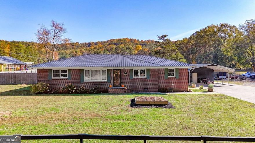 Welcome home to this charming brick ranch offering 4 bedrooms and 3 baths in the peaceful community of Fairmount. With an updated primary suite, a large level fenced backyard perfect for gardening or raising animals, and an outdoor gazebo with newer hot tub, this property blends comfort with country living. Additional perks include no HOA, an extra 22x10 storage building, and a second driveway for added parking.     A cozy homestead with room to grow-ready for you to make it your own!