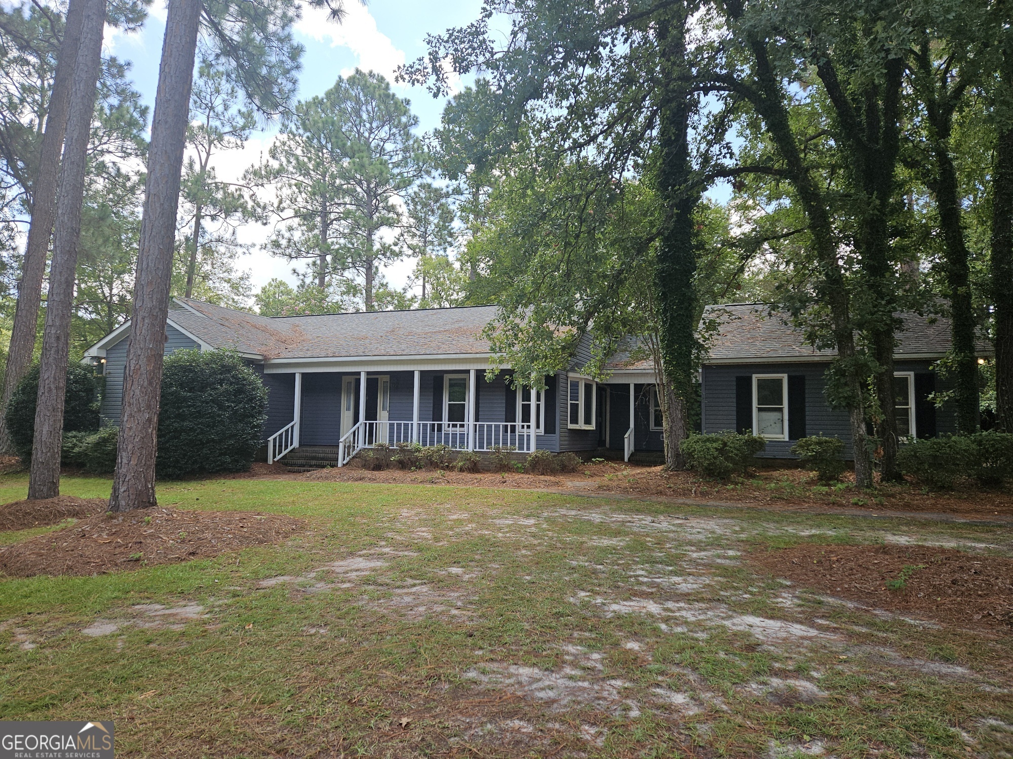 Spacious 3 bedroom 2 and a half bath house in Saddle Creek. Wood flooring and brick pavers through out with updated kitchen and baths. Plenty of storage and added features to see. Mature landscaping with screen porch and deck to enjoy the inside and the outside. *There is a tenant on the property so do not go to the property without an agent.