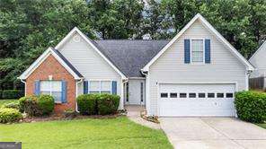 Award winning Mill Creek school district. This charming rancher style boasts an additional huge bonus bedroom upstairs Numerous upgrades were done in 2020 such as new roof, new water heater, new floors (new carpet, new LVP at the bathroom), new light fixtures, new dishwasher, new garbage disposal, new microwave, new granite kitchen countertops, new stove, new toilets, new faucets, new garage opener. New interior paint happening next week. A/C is recent. 3 bedrooms on main. backyard is cleared of trees, behind back fence is wooded view, no visible back neighbors. screened in porch at back of home with view of private backyard and wooded backyard, storage room in backyard. Close to highway, great schools, Plenty of shopping and restaurants. NO HOA but optional swim and tennis club is available