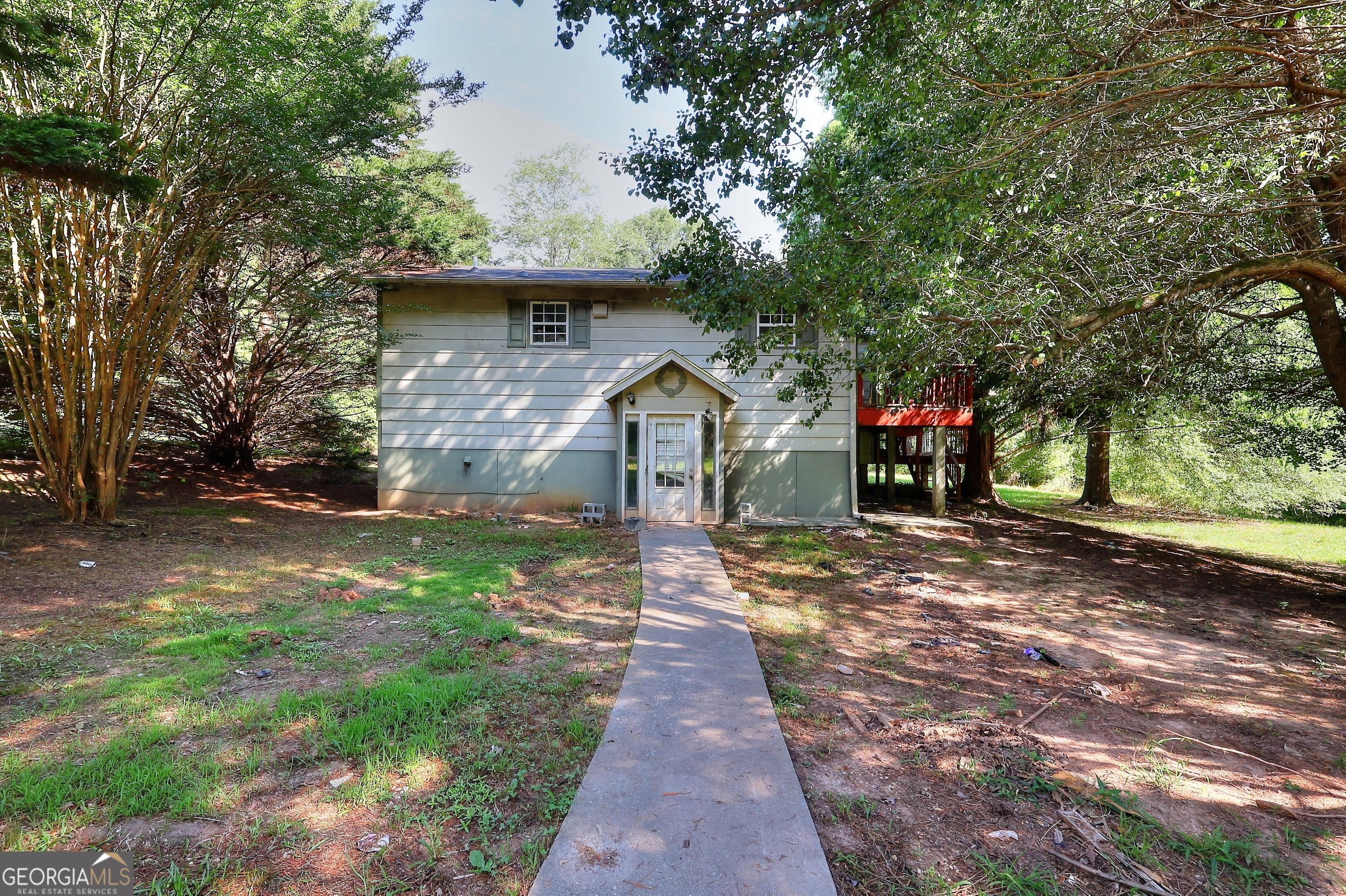 Fixer upper on almost 9 acres just outside the city limits of Monroe. This lot is private and secluded yet moments away from downtown Monroe. The home is in need of a full remodel. The structure was originally built in 1984. It has over 2000 sq ft of living space. BRING ALL OFFERS. This property is shown by appointment only. No Trespassing.
