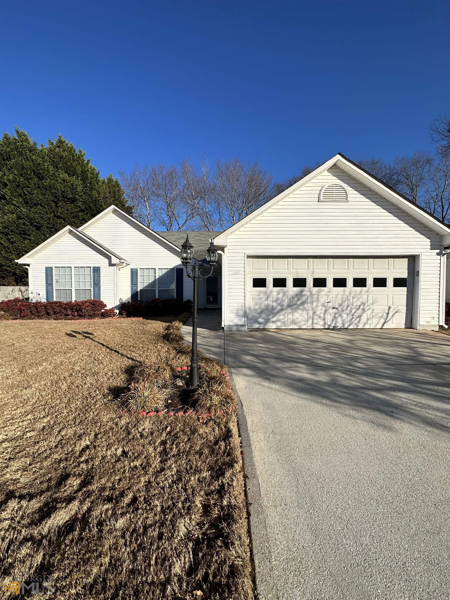Super cute 3/2 ranch home perfectly located off Hwy 124 in Lawrenceville. Vaulted family room with fireplace and open kitchen with breakfast area. Master bath with garden tub and separate shower plus 2 large secondary bedrooms. Outside, enjoy the screened porch and the fenced back yard. 2 car garage. Ready for move-in this home is convenient to schools, Gwinnett Fairgrounds and The Shoppes at Webb Ginn. Priced to sell!