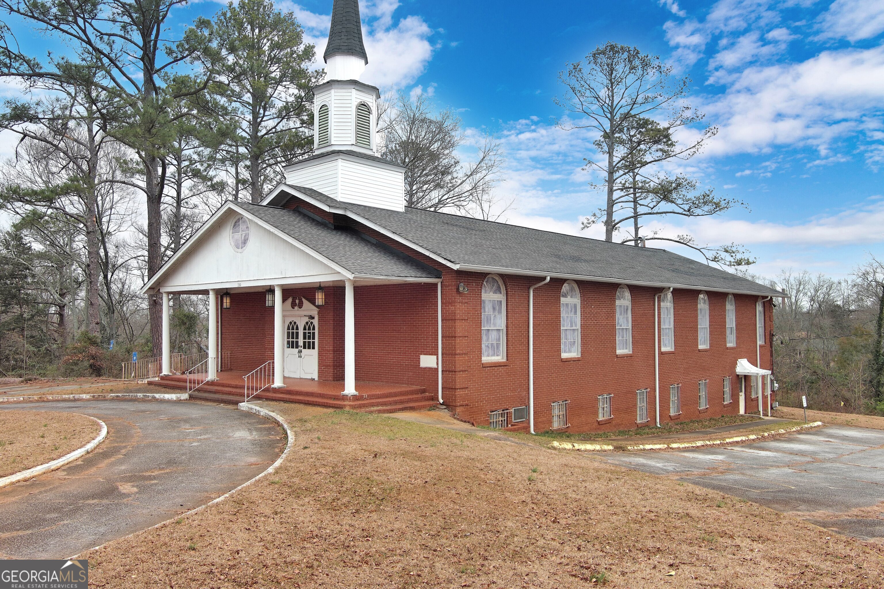 This impressive 7,416 sq ft church property, located at 330 N 16th Street in Griffin, GA, sits on 3.461 acres of land. The spacious building offers ample room for worship, gatherings, and community events, making it an ideal space for a variety of uses. With its prime location and generous lot size, this property offers great potential for redevelopment, expansion, or continued use as a place of worship. The site provides plenty of outdoor space, and the building itself is well-suited for a range of possibilities. List price is based off of current appraisal.