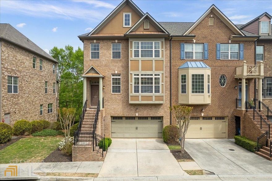 Immaculate 5 bed/4.5 bath townhome in gated community. This multi-story townhome with tremendous square footage offers an unbeatable location in the heart of the best shopping, dining and entertainment Alpharetta has to offer – all within a short jaunt from your front doorstep. The desirable end unit features a kitchen with stainless-steel appliances, two fireplaces, beautifully finished basement with full bath, multiple deck options with a screened porch overlooking the protected wooded preserve, AND the HOA covers lawn maintenance and pool access so you can spend the hot summer days at the pool instead of doing yard work!