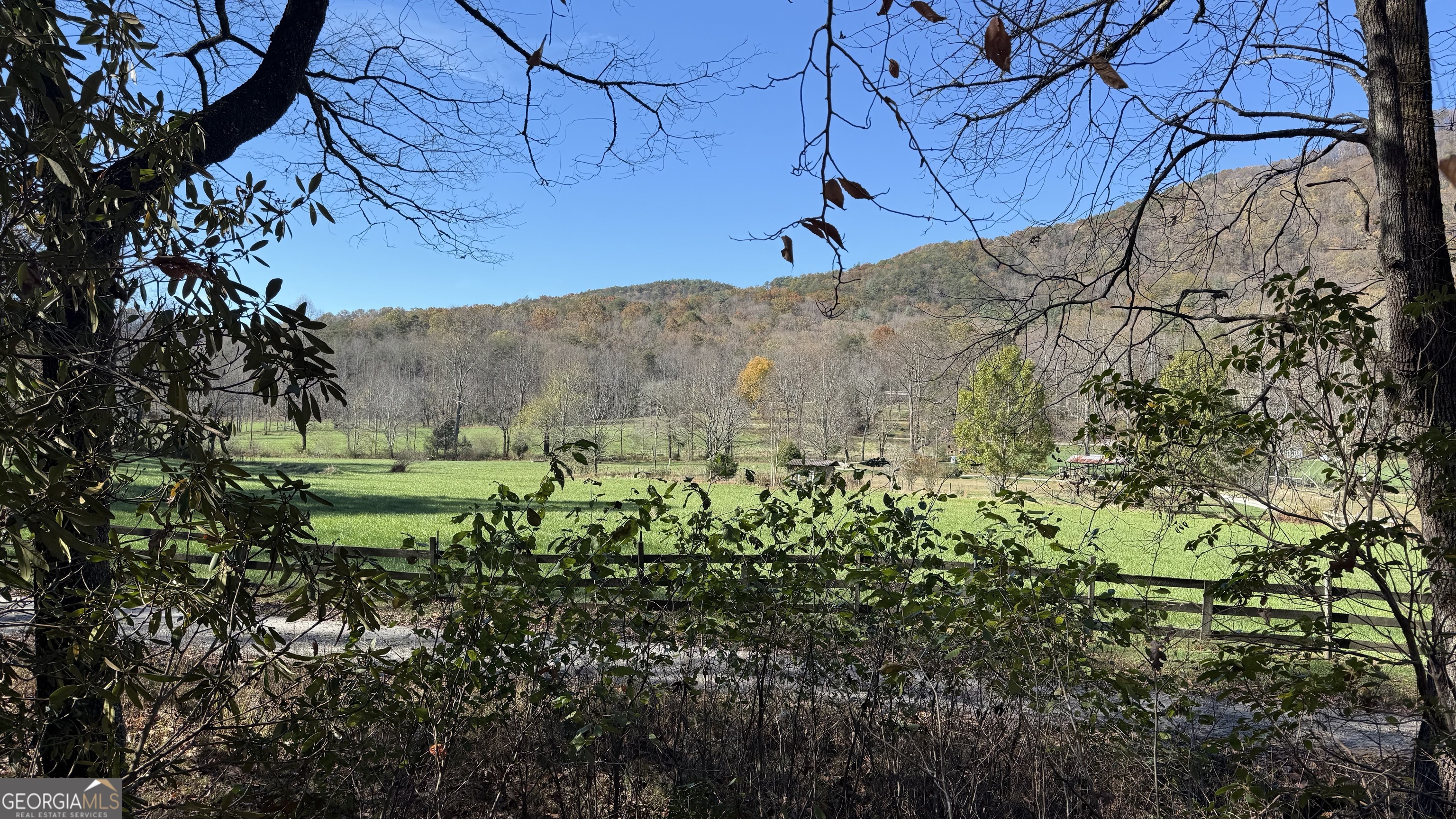This 1-acre property is ideal for building your dream home or creating a private mountain getaway...only minutes from Lake Burton. Nestled amidst nature, this property offers two tranquil streams flowing through the land, providing a picturesque setting for relaxation. A 20x14 building/Cabin on-site offers endless possibilities. With power already available, your vision for a peaceful retreat is one step closer to reality. Don't miss this opportunity to own your slice of mountain paradise! If you are looking for additional acreage, MLS #10420110 offers an additional 12.84 acres.