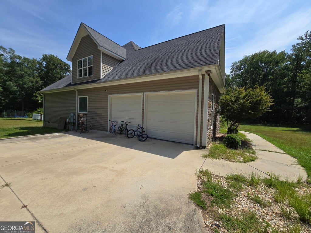 Photo of 325 Rain Valley Circle, Meansville, GA 30256 (MLS # 10846520)