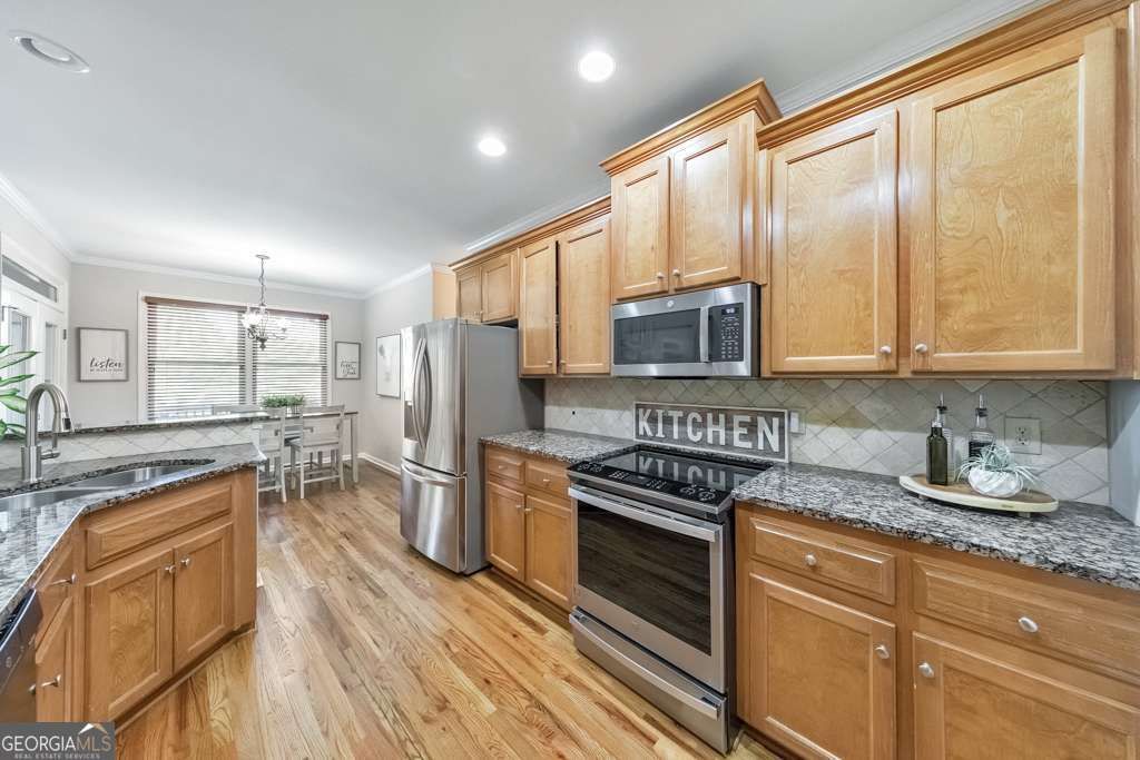 Photo of 304 Turning Leaf Court, Canton, GA 30115 (MLS # 10734322)