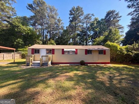 Photo of 1396 Pine Drive, Atlanta, GA 30349 (MLS # 10771875)
