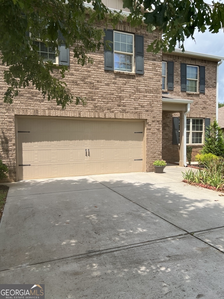 This beautiful four bedroom two and a half bathroom home with great curb appeal and mature plants, Open floor plan, The gourmet kitchen includes granite countertops, Stainless steel appliances and birch cabinetry. The owners retreat has a large walk-in-closet and dual vanities with garden tub and separate shower. Conveniently located nearby shopping, minutes from Atlanta Motor Speedway, cultural and athletic facilities with an easy commute to downtown Atlanta and Hartsfield airport.